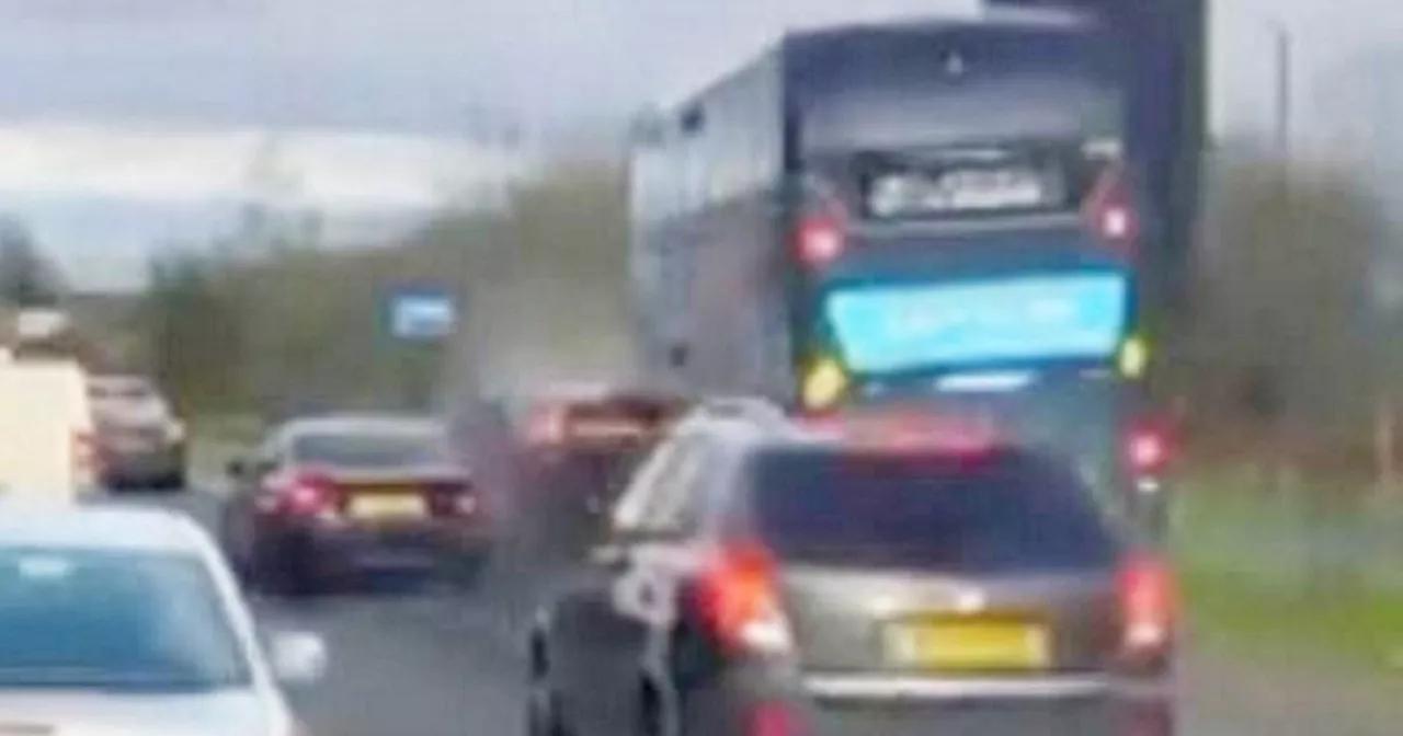 Double-decker smashes into BMW after driver pulls into bus lane