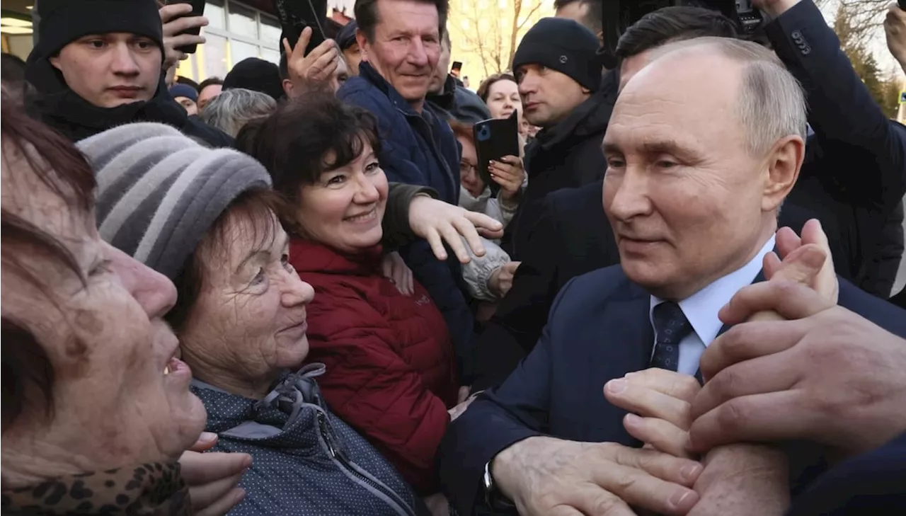 Russians head to polls; Putin expected to win