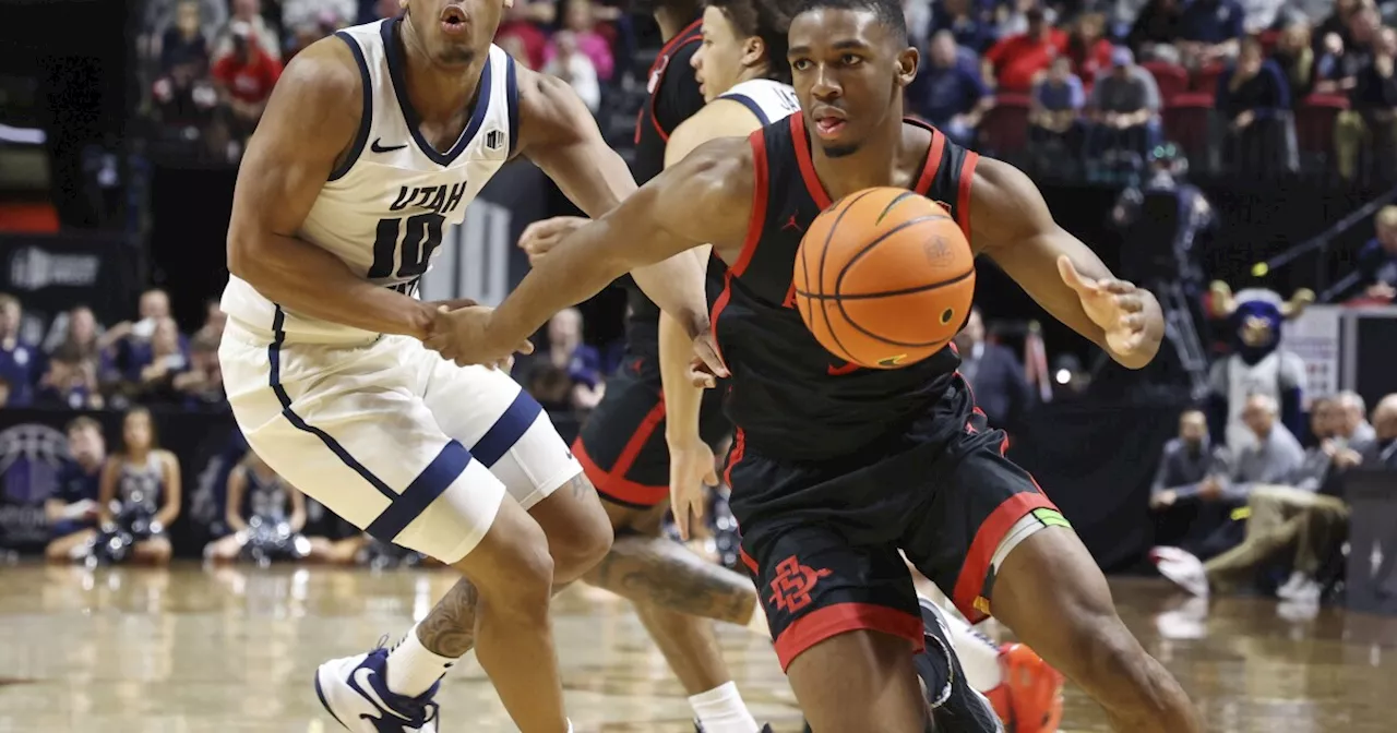 San Diego State knocks off No. 18 Utah State 86-70 in MWC semifinals