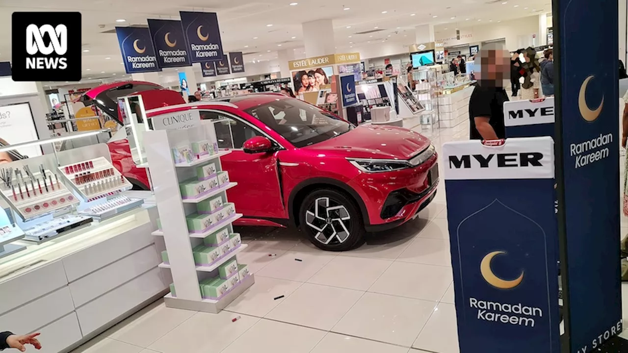 Electric car on display at Liverpool Westfield reverses into Myer shopfront, 14yo boy questioned