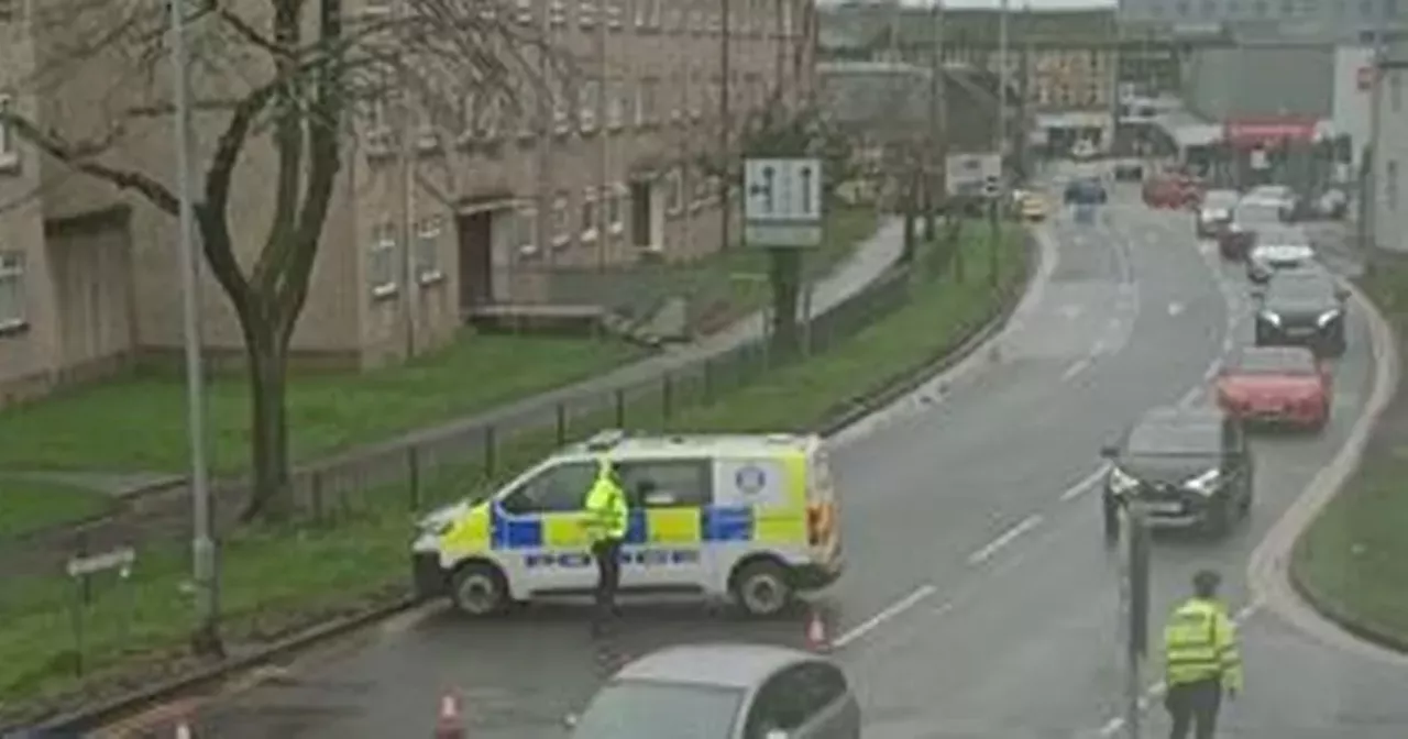 Two people taken to hospital after Kilmarnock crash sees car flip on its side