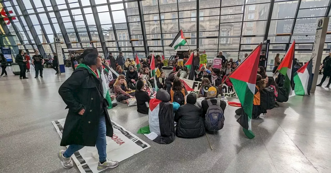 Pro-Palestine protesters march through Glasgow Queen Street train station