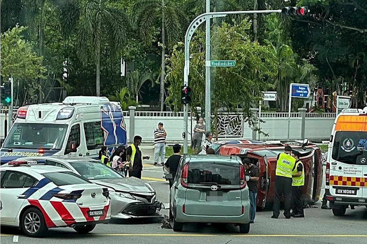 Car turns turtle after three-vehicle accident in Singapore's Woodlands