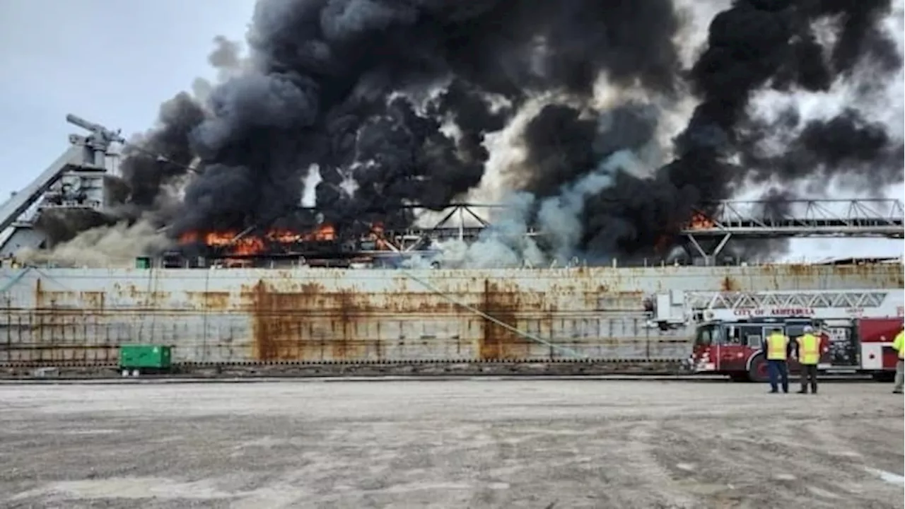 Cuyahoga, one of the oldest Great Lakes ships, is on fire in Lake Erie