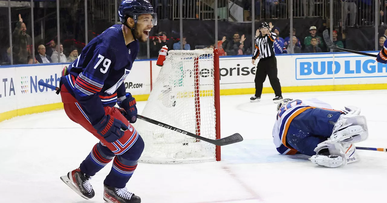 Rangers get it together after slow start, steamroll Islanders