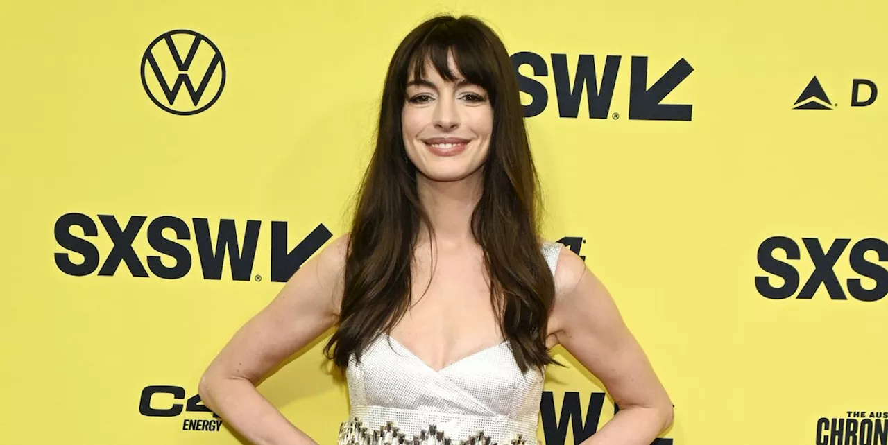 Anne Hathaway Is So Cheery in a Sparkly White Minidress Adorned With Gold Studs