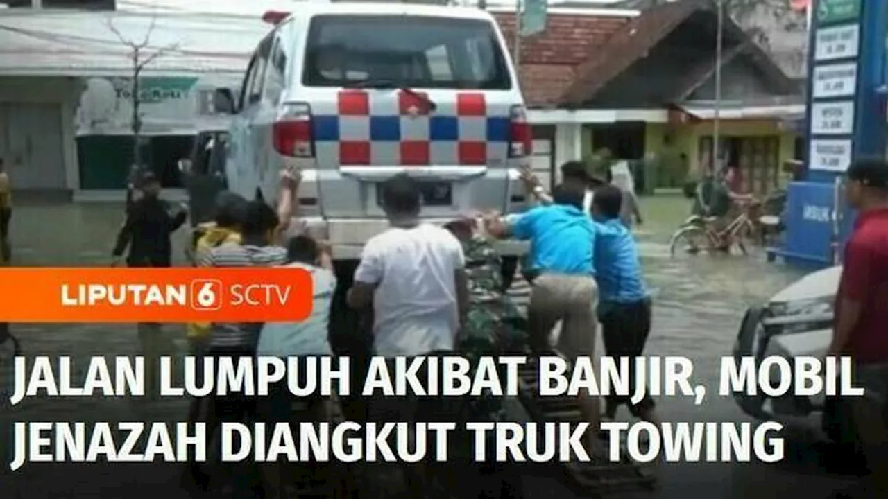 VIDEO: Banjir di Grobogan Meluas, Mobil Jenazah Diangkut Truk Towing Terobos Banjir