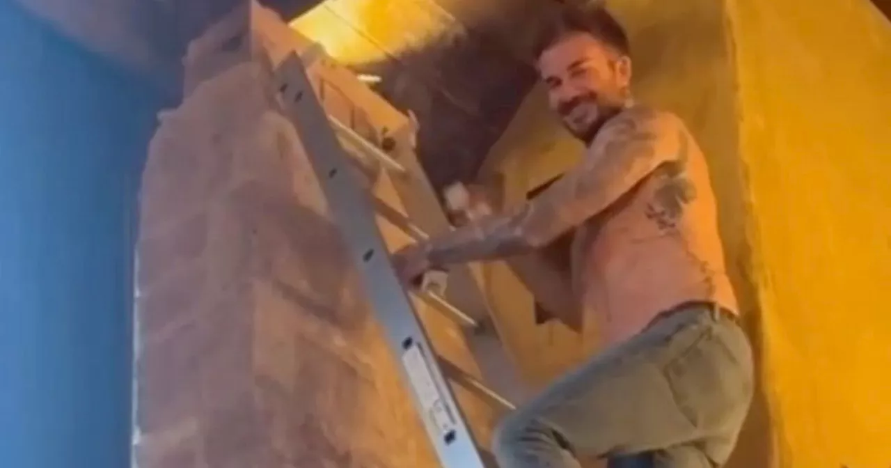 Victoria Beckham thrills fans with topless video of David completing some DIY