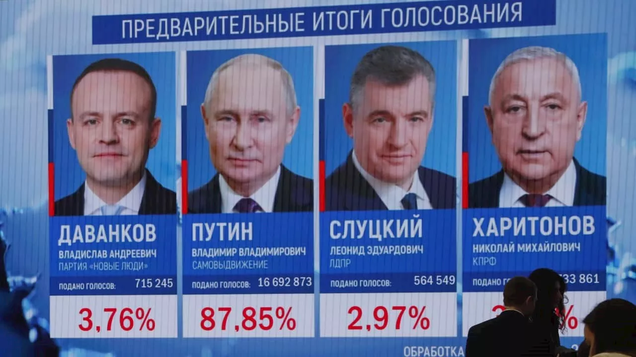 Record turnout as Vladimir Putin wins six more years in power