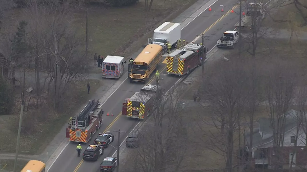 Truck driver seriously injured in collision involving school bus in Whitby