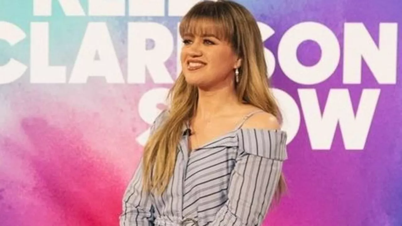 Kelly Clarkson looks slimmer than ever in flirty spring dress after losing 40lbs while chatting up...