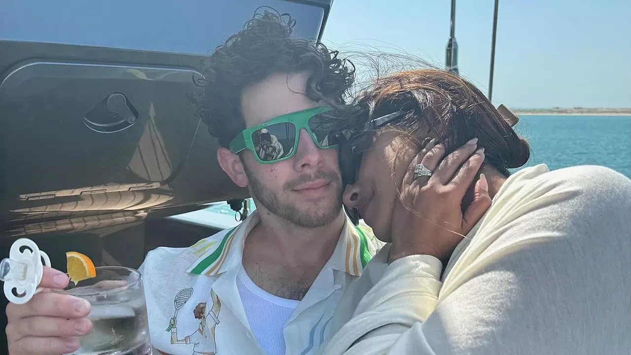 Priyanka Chopra and Nick Jonas snuggle as they enjoy family time with their daughter Malti Marie, 2,...