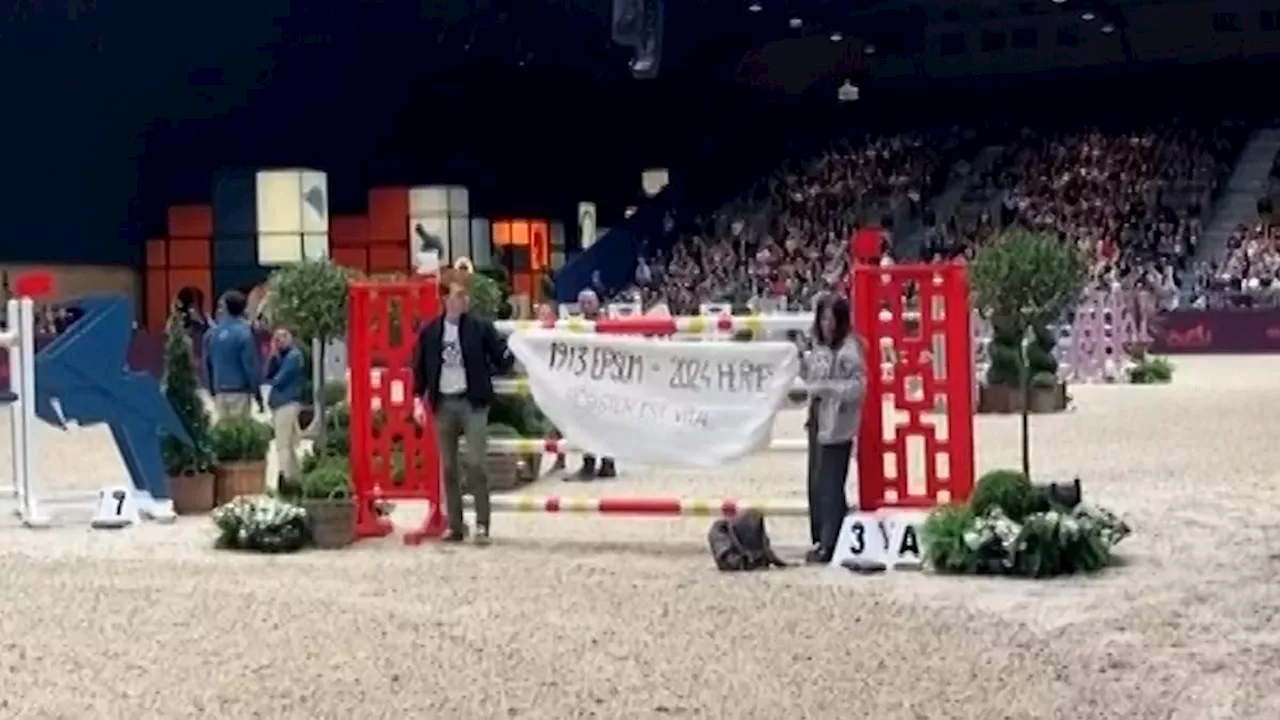 French eco-activists storm show jumping event in Paris