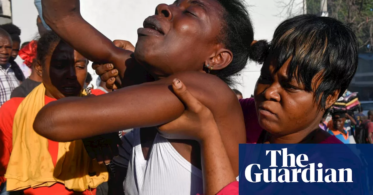 At least a dozen dead as gang violence spills into wealthy areas of Haiti capital