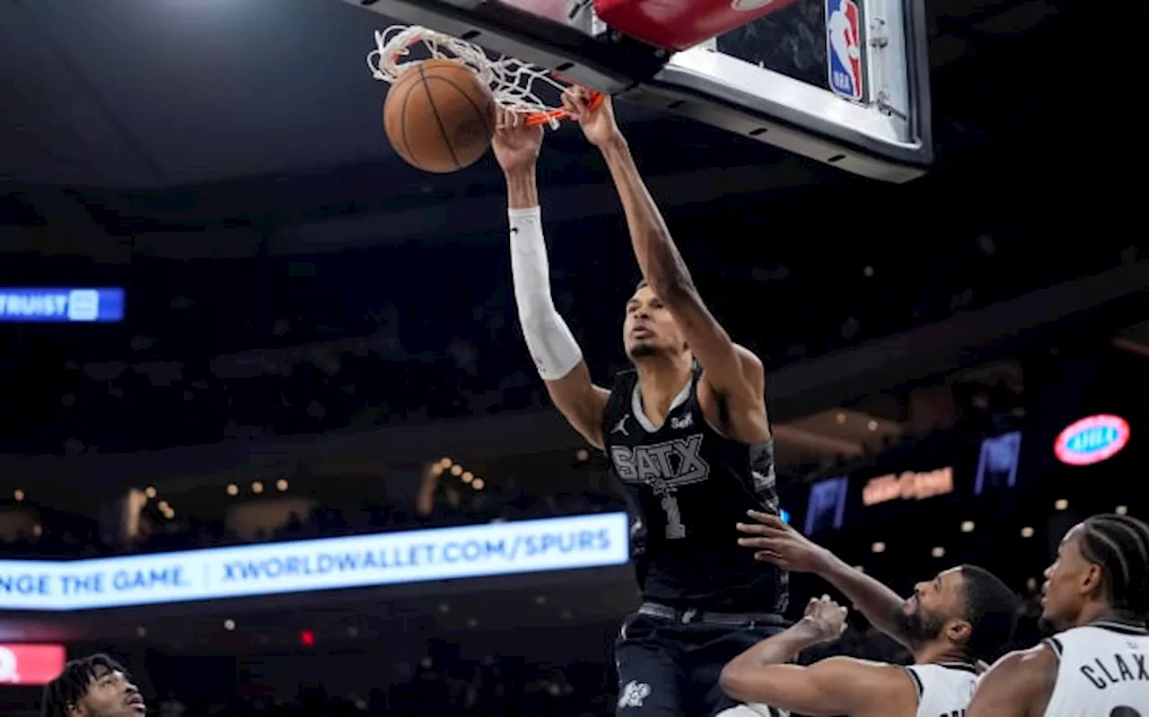 Wembanyama’s 33 points, 16 rebounds power the Spurs past Nets 122-115 in overtime