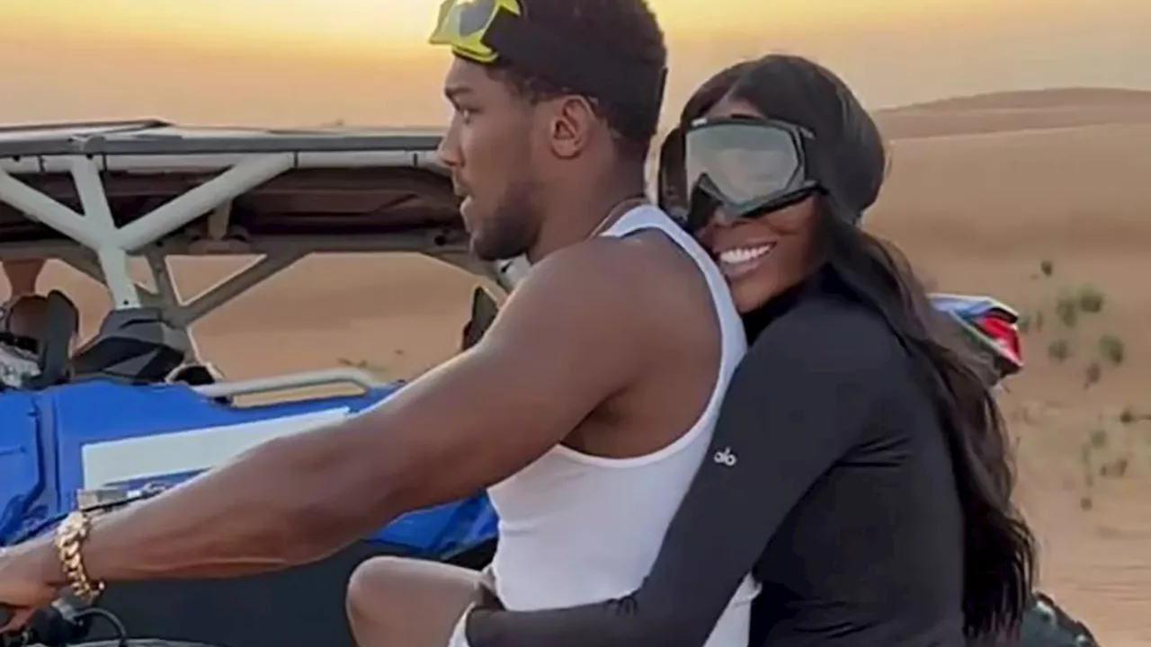 Anthony Joshua gets ‘very cosy’ with Brit hairdresser in Dubai desert after she congratulated him after bru...