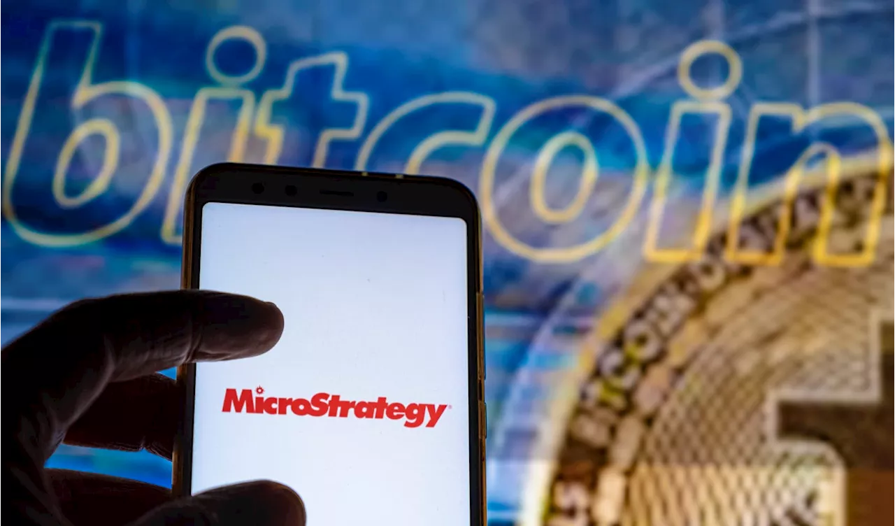 MicroStrategy, largest corporate holder of bitcoin, drops as much as 18% as cryptocurrency falls