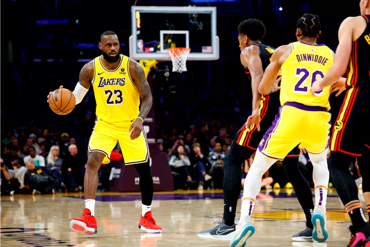 LeBron James scores 25, D'Angelo Russell ties Lakers 3-pointers record in 136-105 win over Hawks