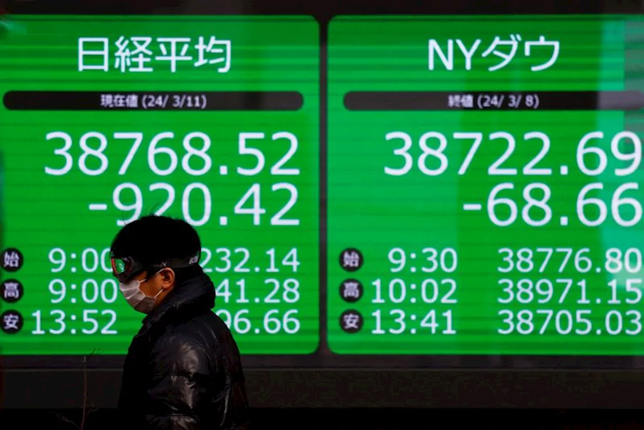 Japanese stocks down, yen steady as markets brace for landmark BOJ shift