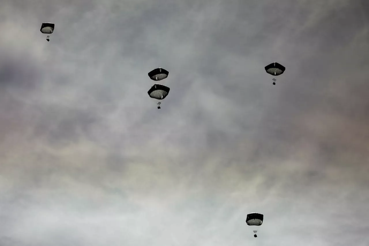 U.S. military airdrops thousands of meals into Gaza in emergency humanitarian aid operation