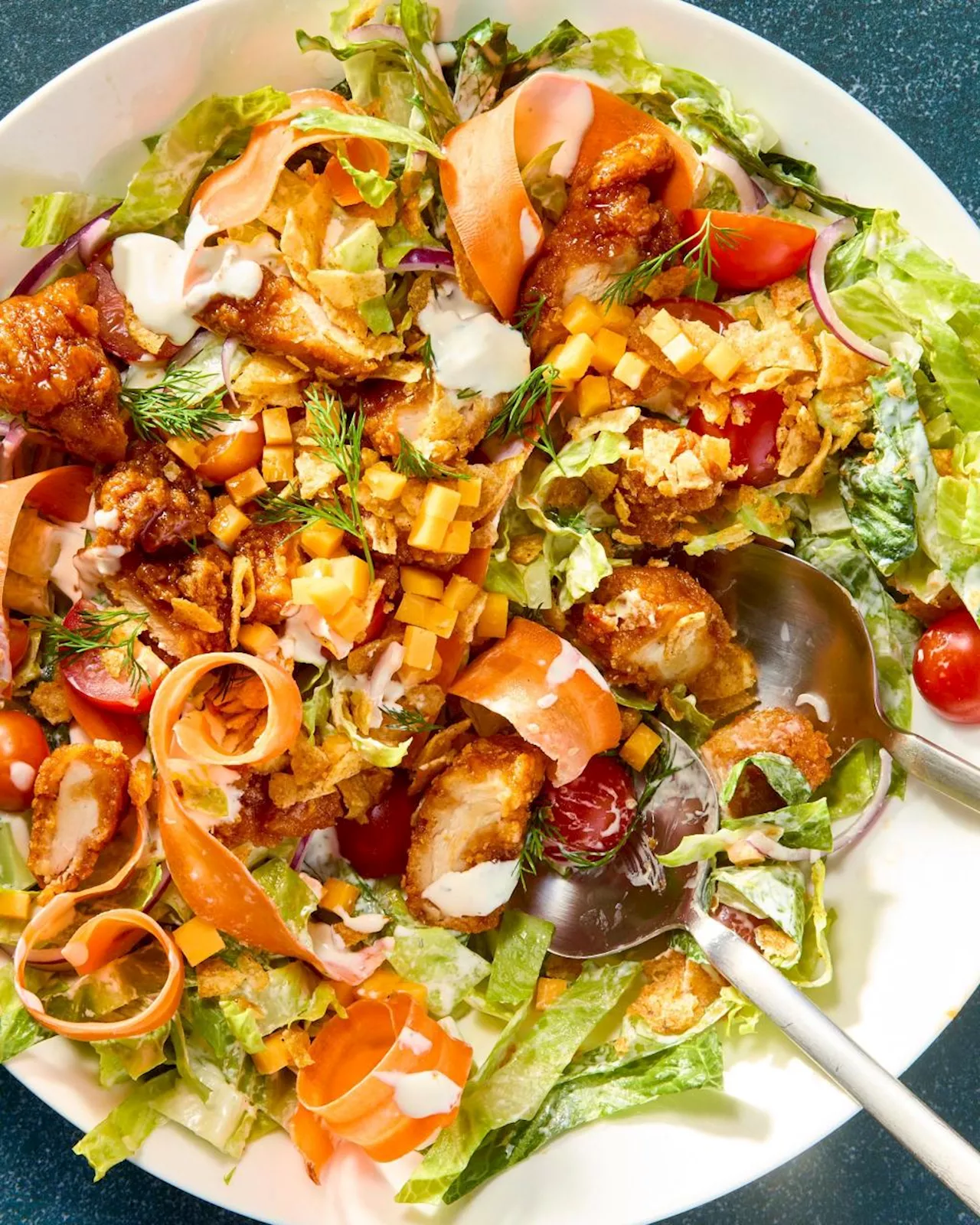 The Kitchn: What makes this sticky chicken salad so delicious? Three words: crushed barbecue chips