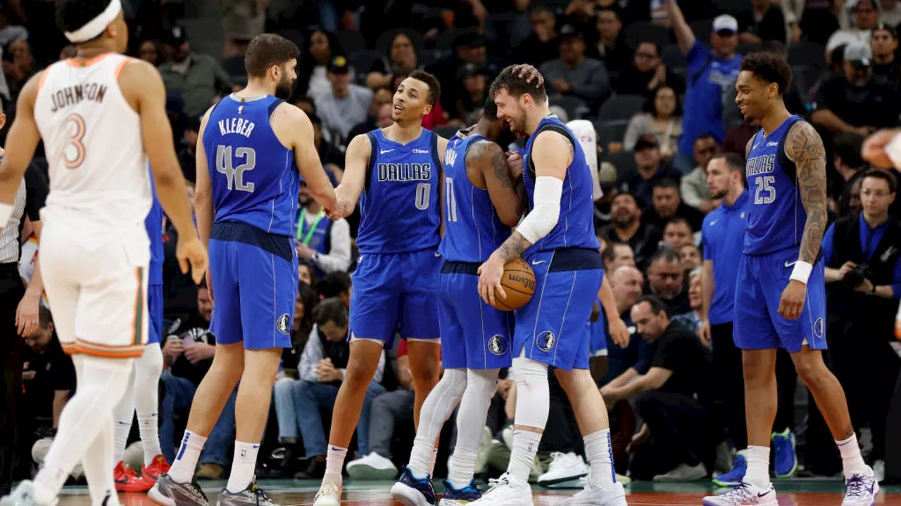 Kyrie Irving, Luka Doncic lead Mavericks past Spurs 113-107 to sweep season series