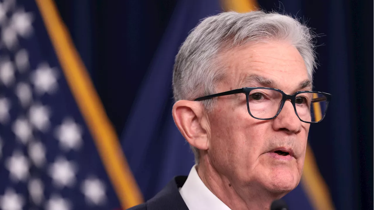 Federal Reserve holds interest rates steady, projects three rate cuts later this year