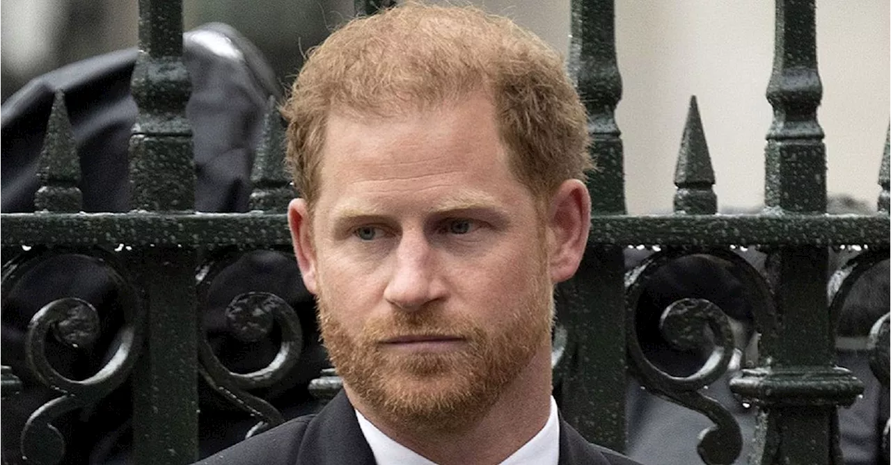 Prince Harry says tabloids intercepted phone calls of his mother, the late Princess Diana, and father