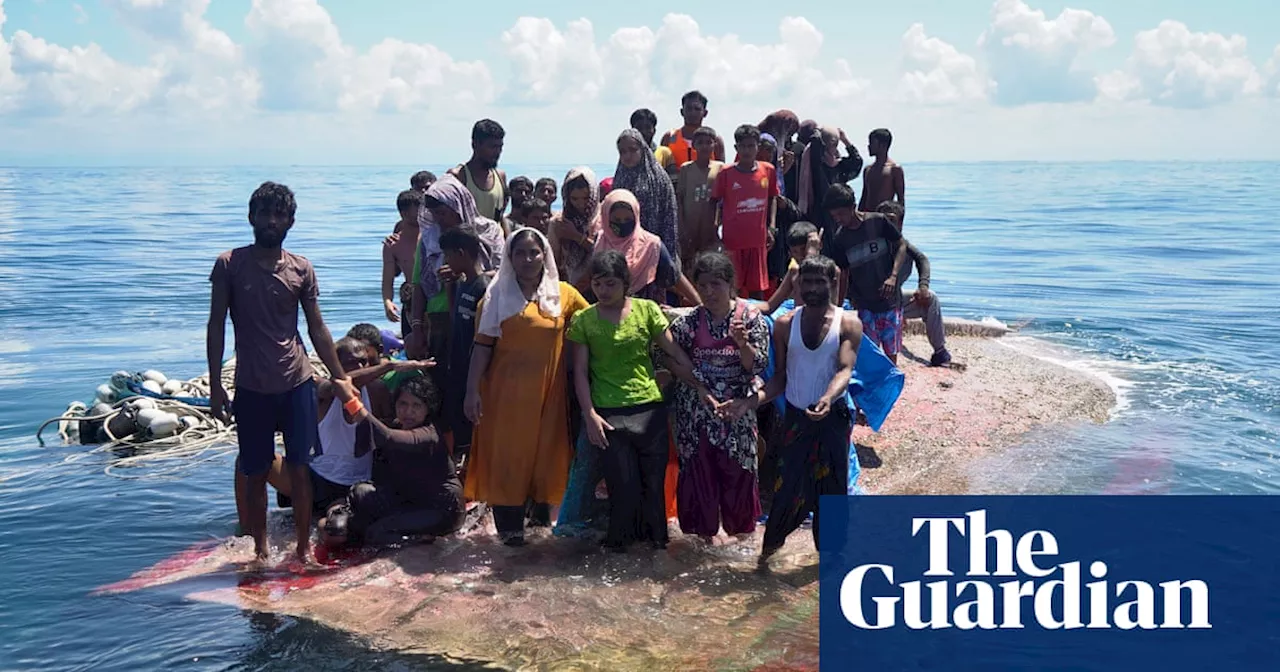 Dozens of Rohingya refugees rescued from overturned boat in Indian Ocean