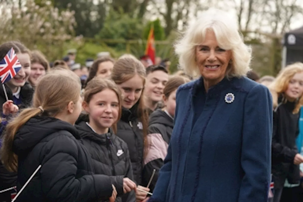 UK’s Queen Camilla jokes her grandson Louis is ‘quite a handful’