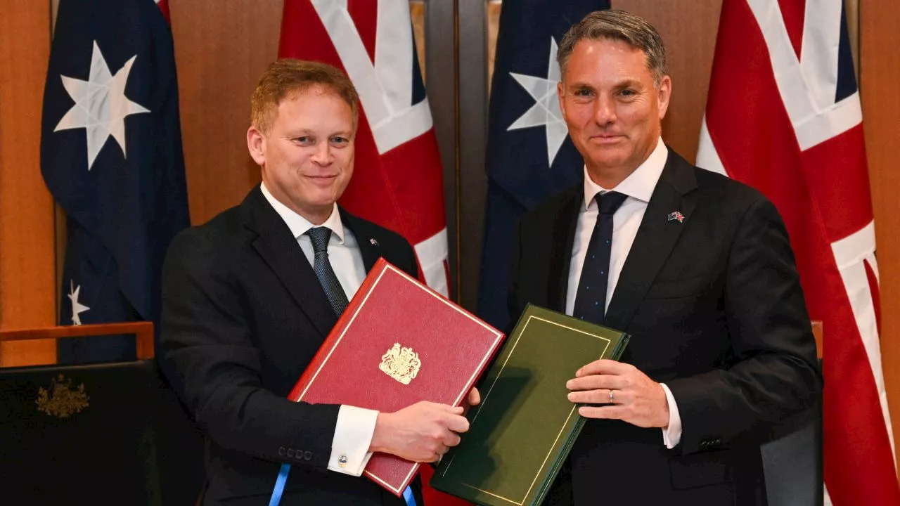 Marles unveils ‘timely’ defence treaty with UK, talks up AUKUS