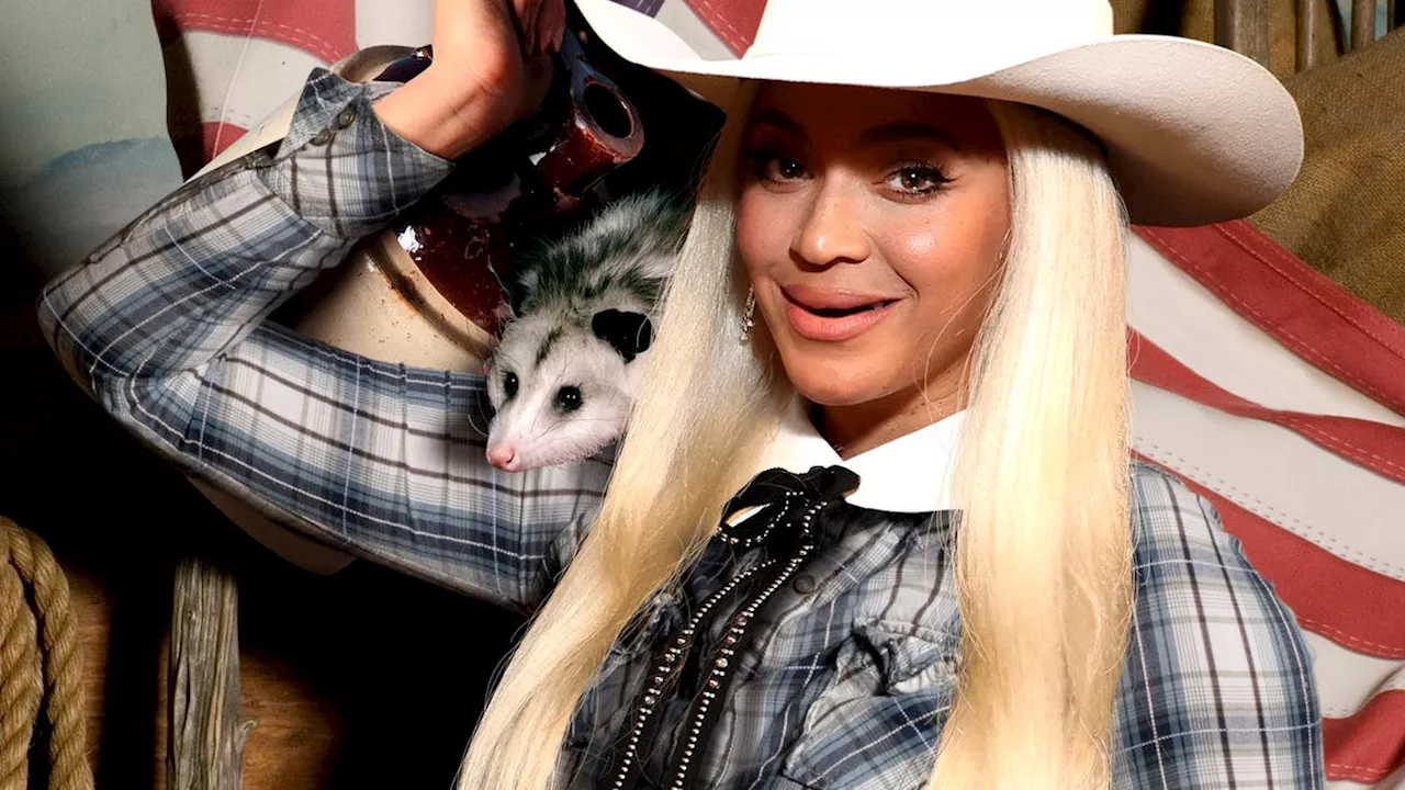 Beyoncé Reveals New Country Album Cover Featuring Toothless Artist Sharing Jar Of Moonshine With Pet Possum