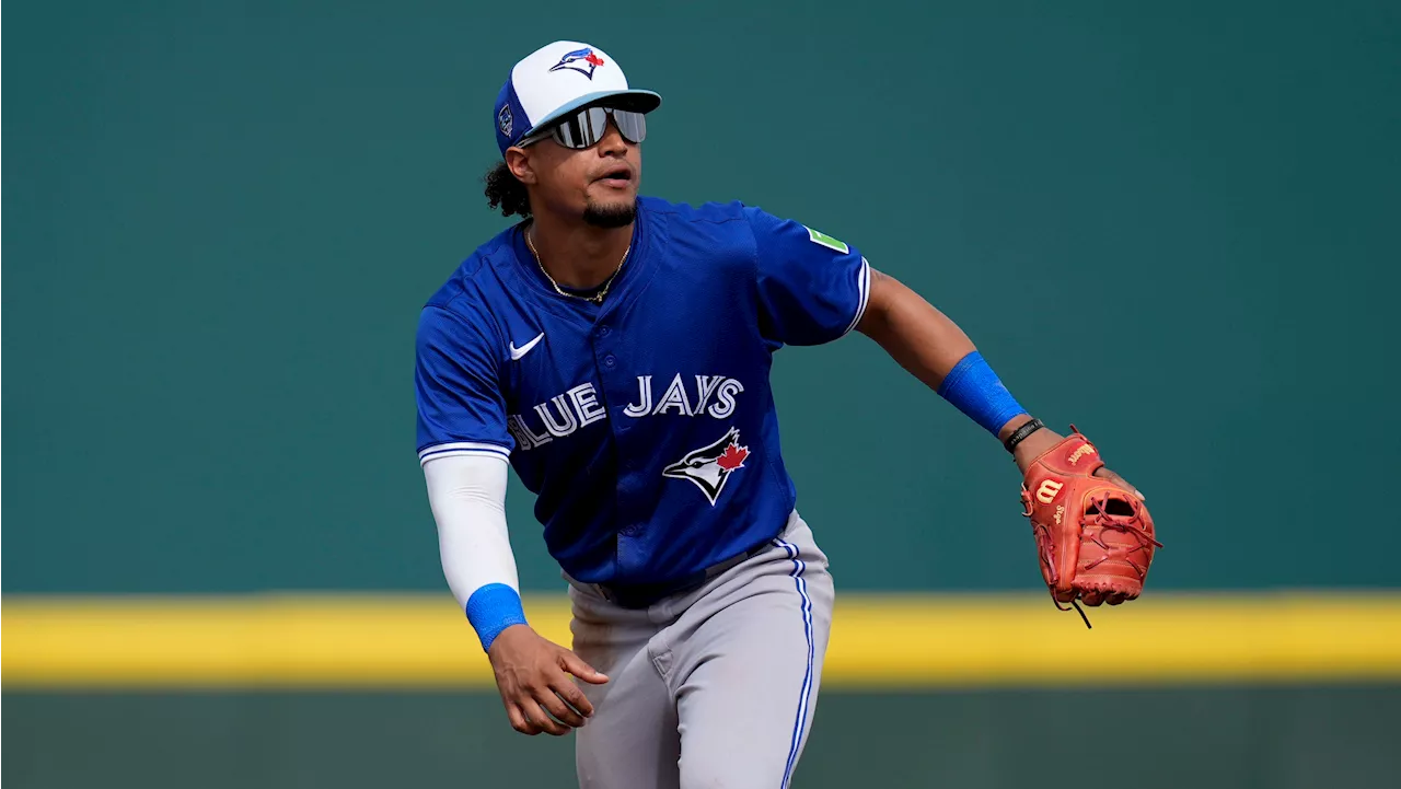 Blue Jays send IF Espinal to Reds for minor league pitcher McElvain