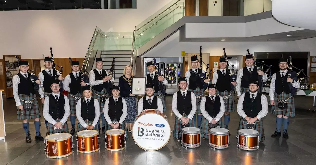 Members of two West Lothian pipe bands honoured at special reception