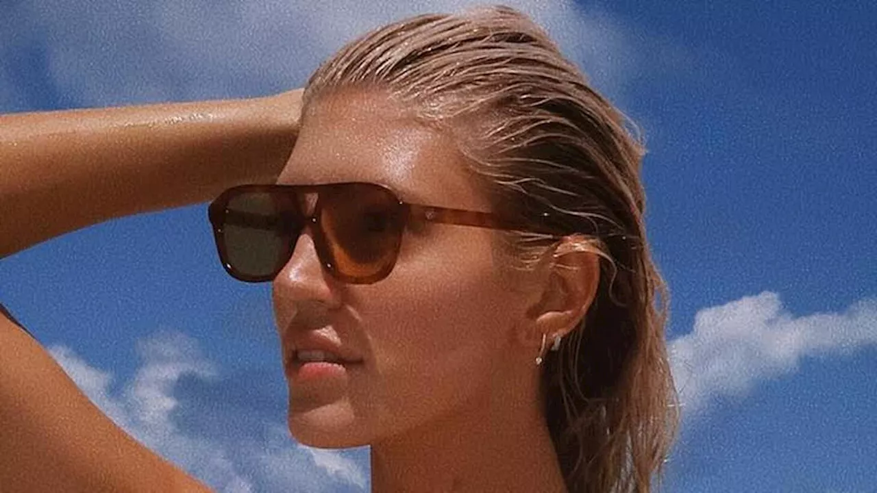 Devon Windsor showcases toned figure in a bikini in sexy throwbacks