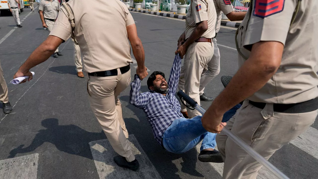 Supporters of India's opposition leader flock to capital in protest of his arrest