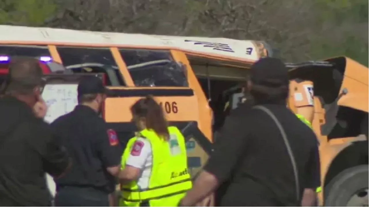 Texas school bus returning from field trip crashes, killing man and child