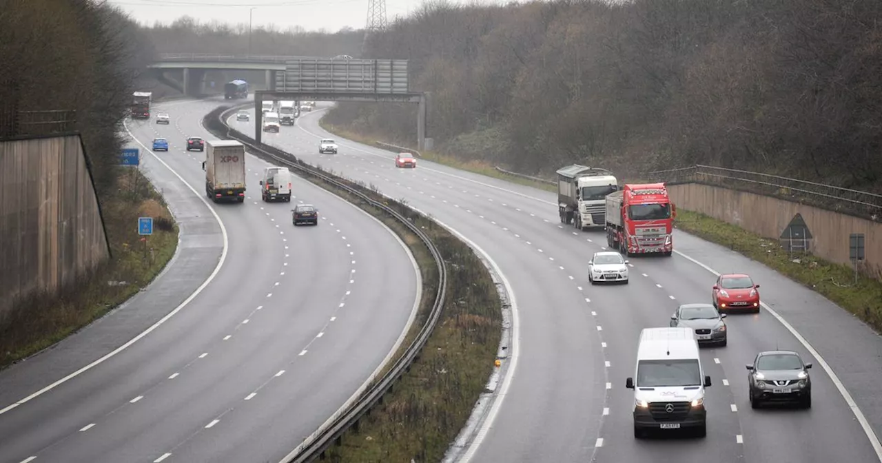 Man 'attacked with hammer' after collision on M61