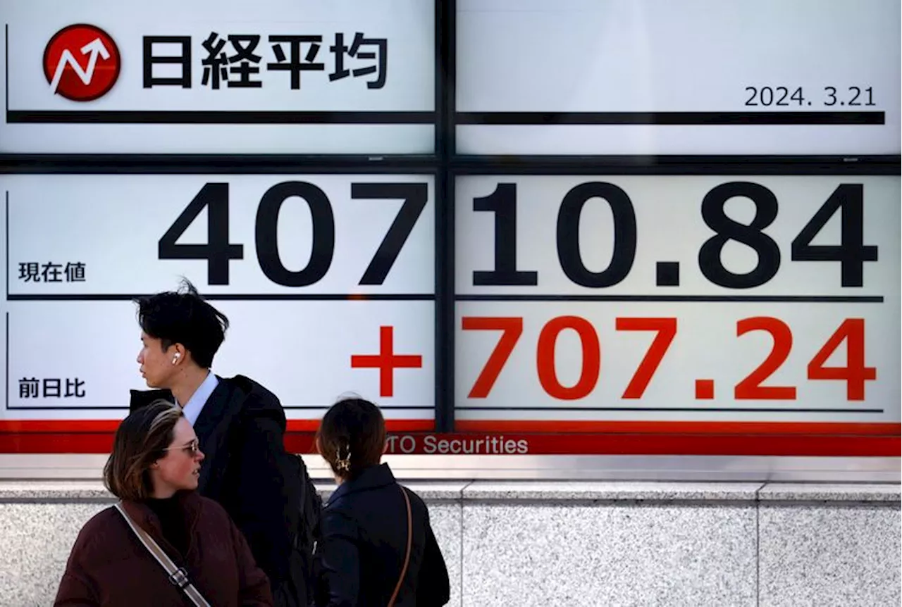 Asia shares on a roll as SNB kicks off rate cuts