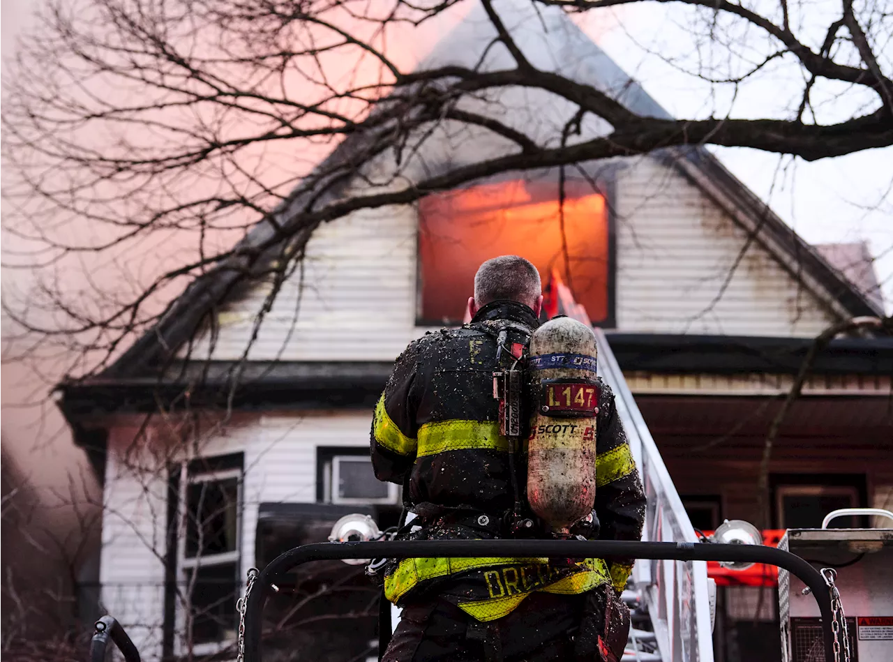 Firefighters rescue woman who was trapped during four-alarm fire in Brooklyn home