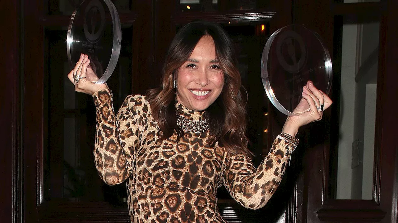 Myleene Klass stuns in leopard print as she celebrates her Inspiration Awards win while leaving the...