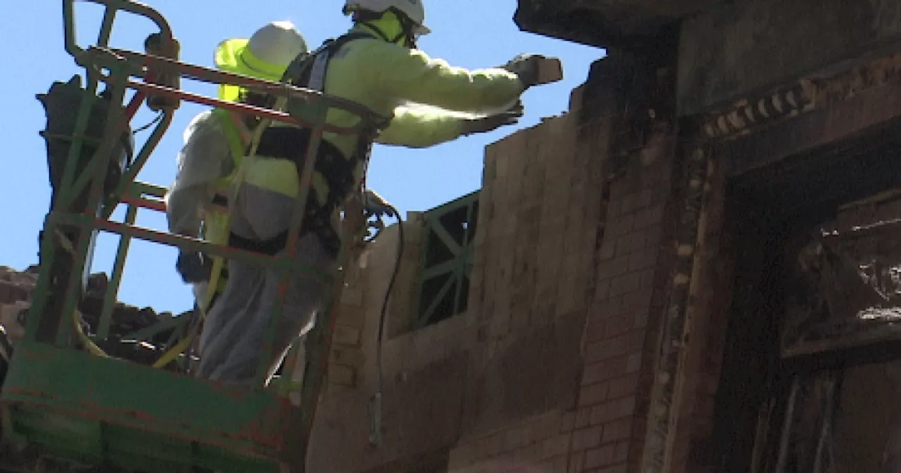 ANOTHER BRICK FROM THE WALL: Bisbee deconstructs buildings affected by fire