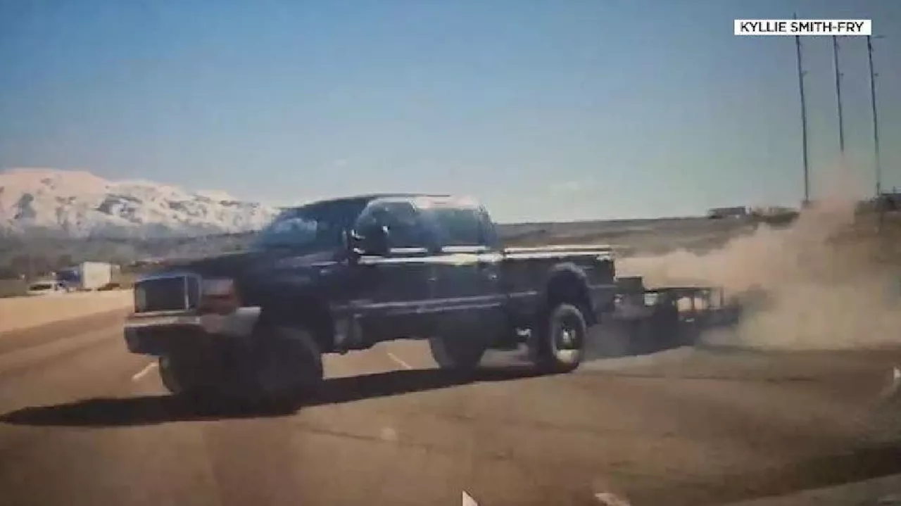 Dashcam shows close call with unsecured trailer on I-15; UHP says driver left behind mess