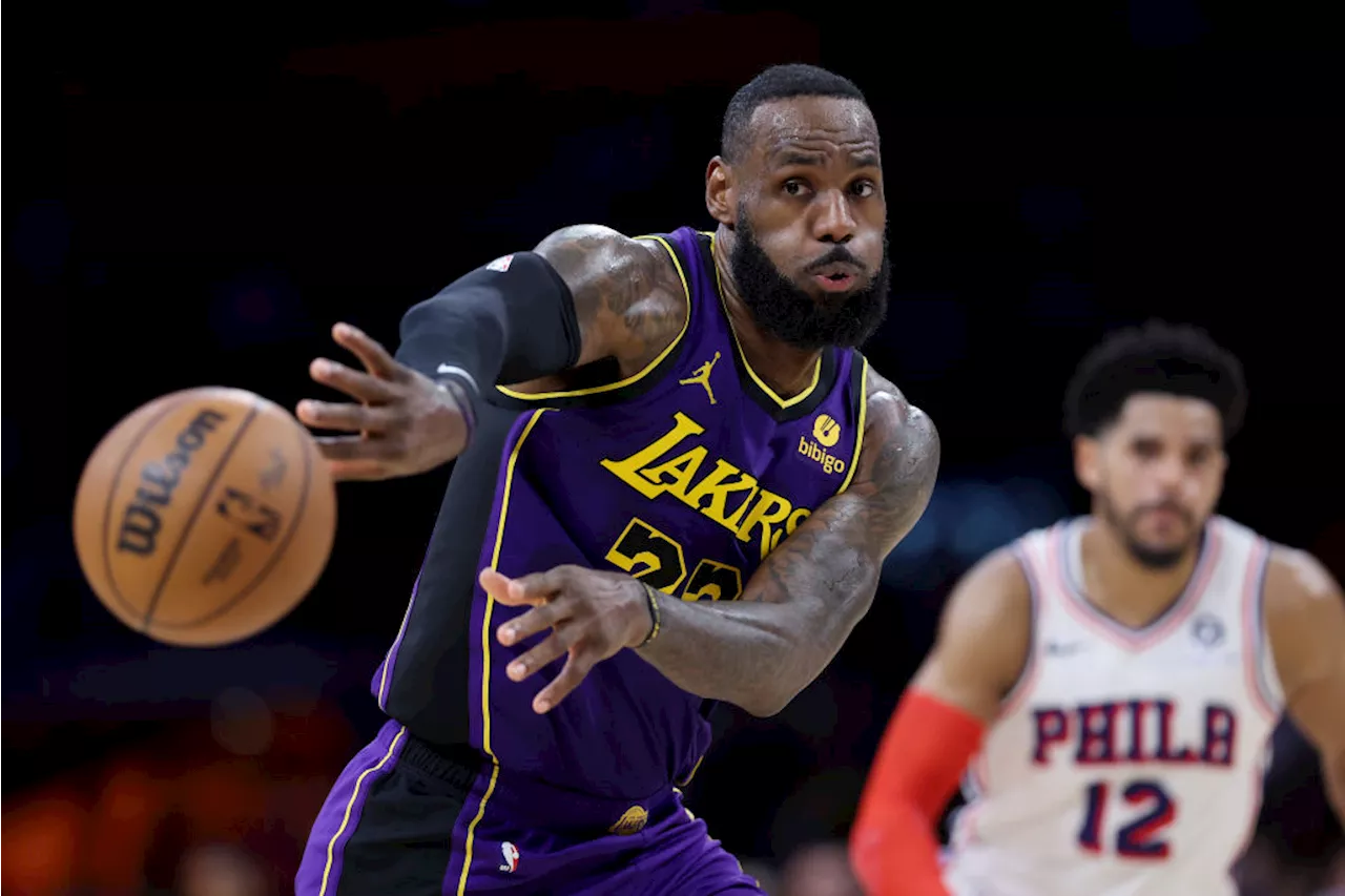 Anthony Davis, LeBron James lead 4th-quarter charge as the Lakers hold off Philadelphia 101-94