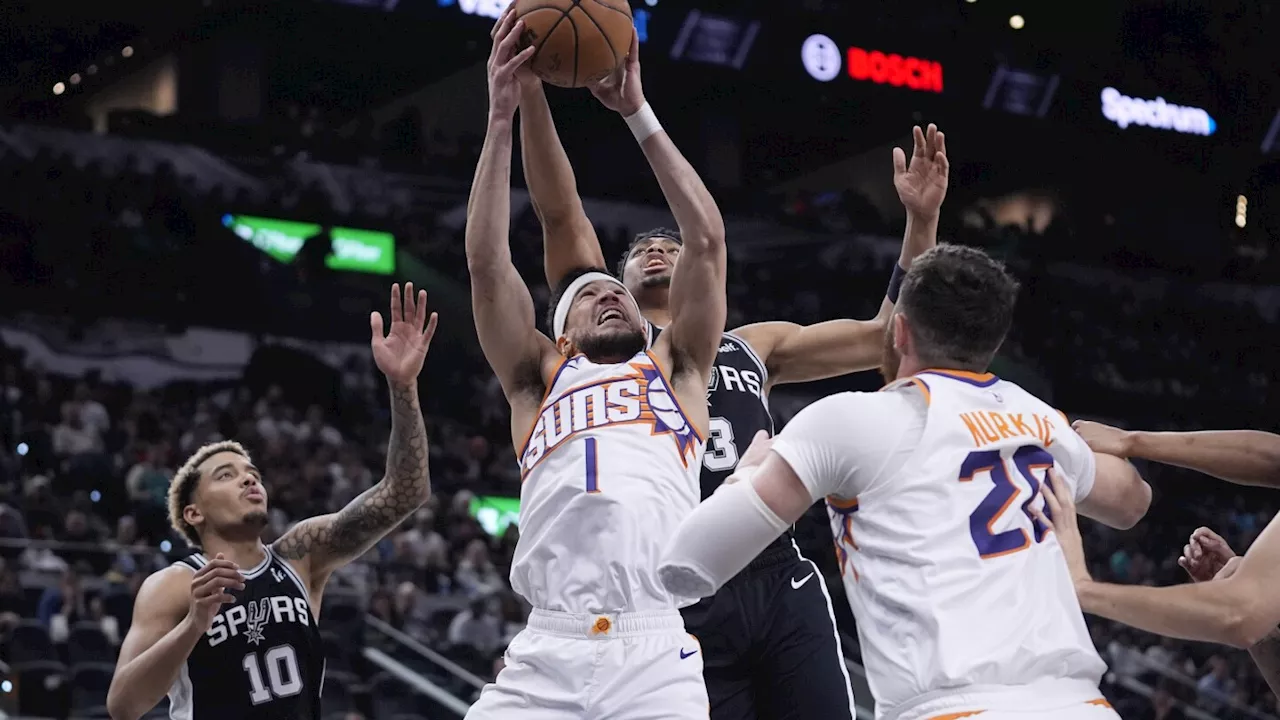 Booker scores 32 points and Suns never trail in steamrolling Spurs 131-106