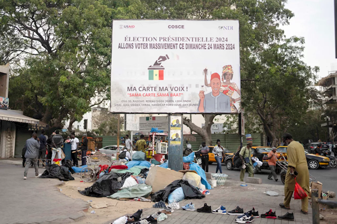 Senegal votes in tightly contested presidential race amid uncertainty | Jack Thompson, Jessica Donati & Babacar Dione / The Associated Press