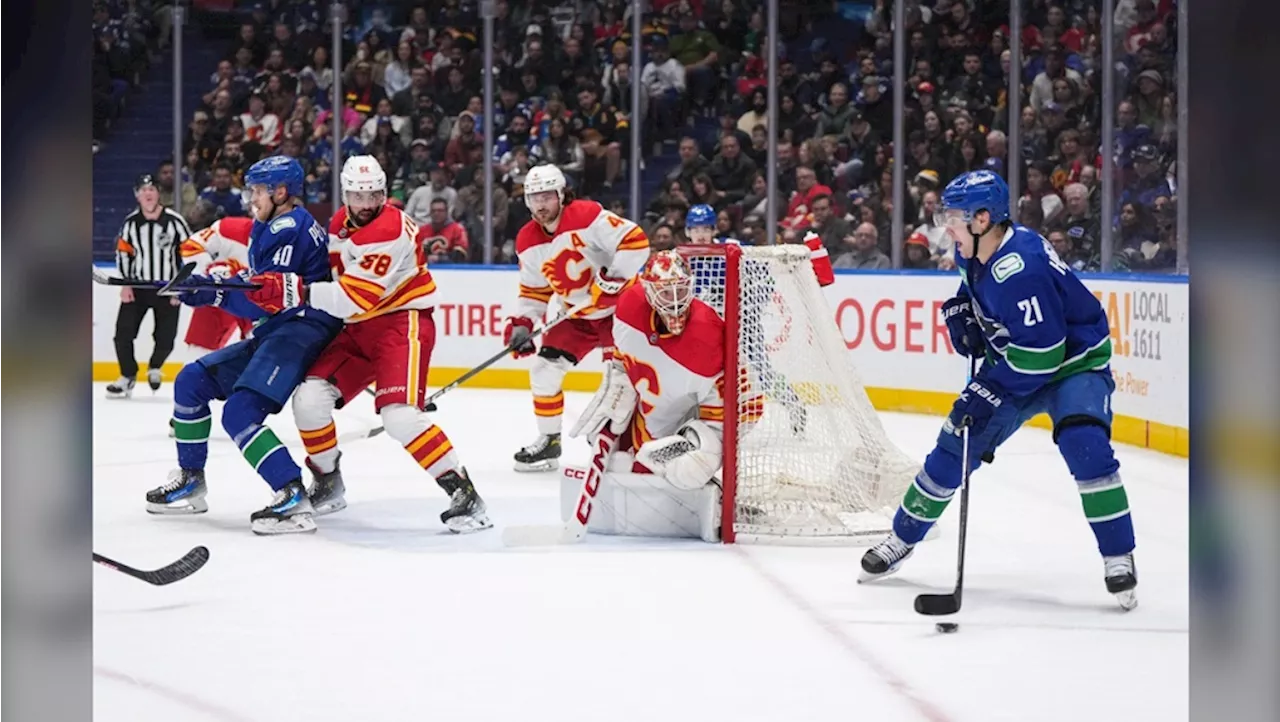 Hoglander scores twice as Vancouver Canucks double up Calgary Flames 4-2