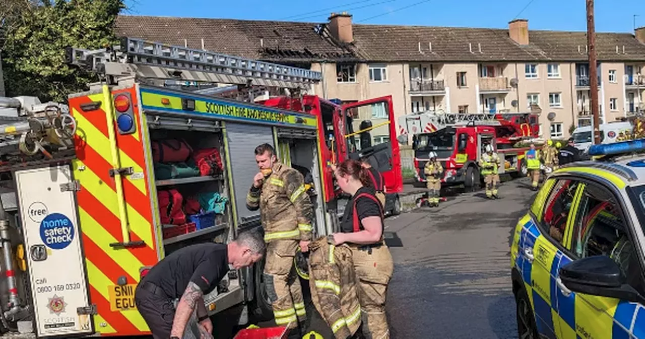 Fierce blaze destroys roof at Scots flats as residents evacuated by fire crews