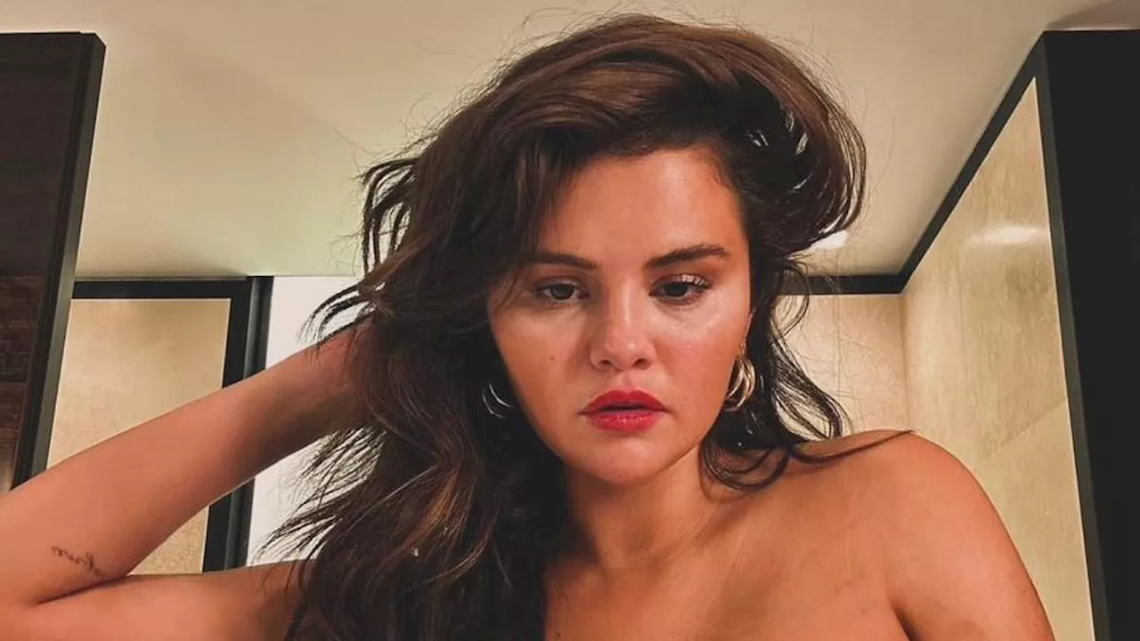 Selena Gomez puts on a VERY busty display in since-deleted Instagram selfies while rocking a...