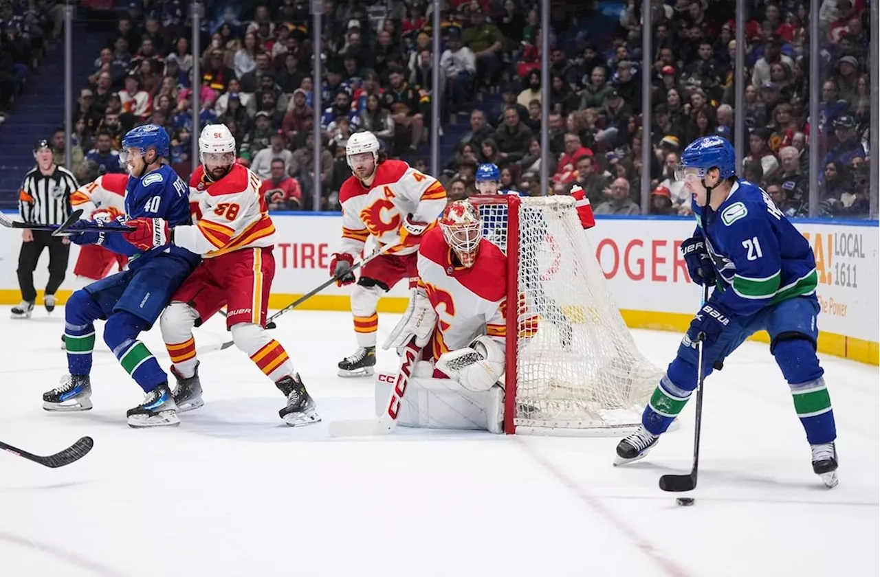 Vancouver Canucks double up Calgary Flames 4-2 as Hoglander scores twice